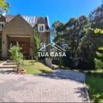 Casa com piscina térmica à venda em condomínio fechado em Canela